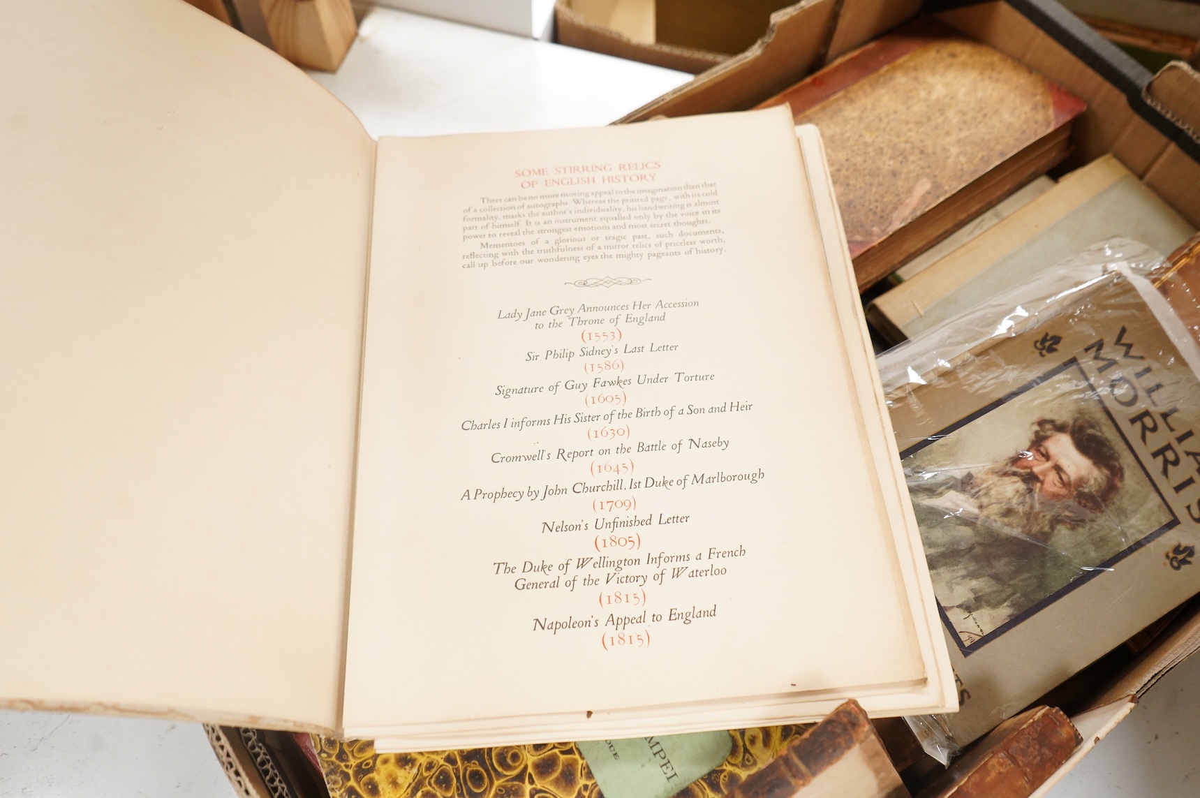 A graduated set of 4 saucepans and a hanging rack- 70 cm wide